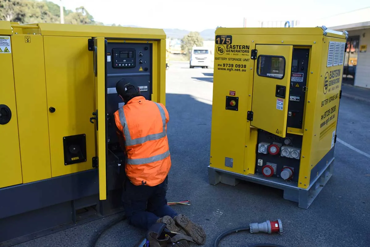 An Eastern Generators technician carrying out a scheduled service on site