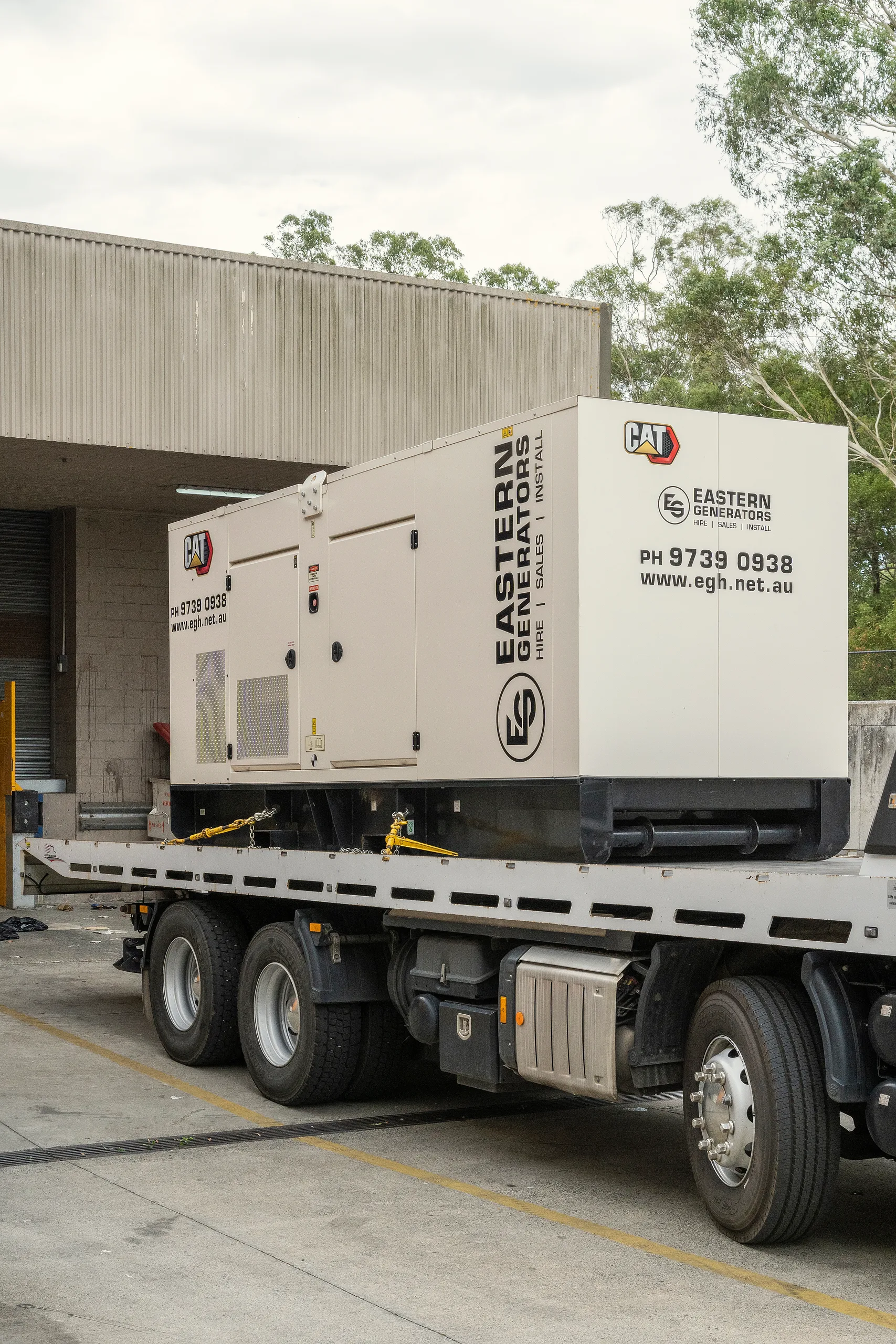 A large canopied Eastern Generators diesel set loaded for delivery