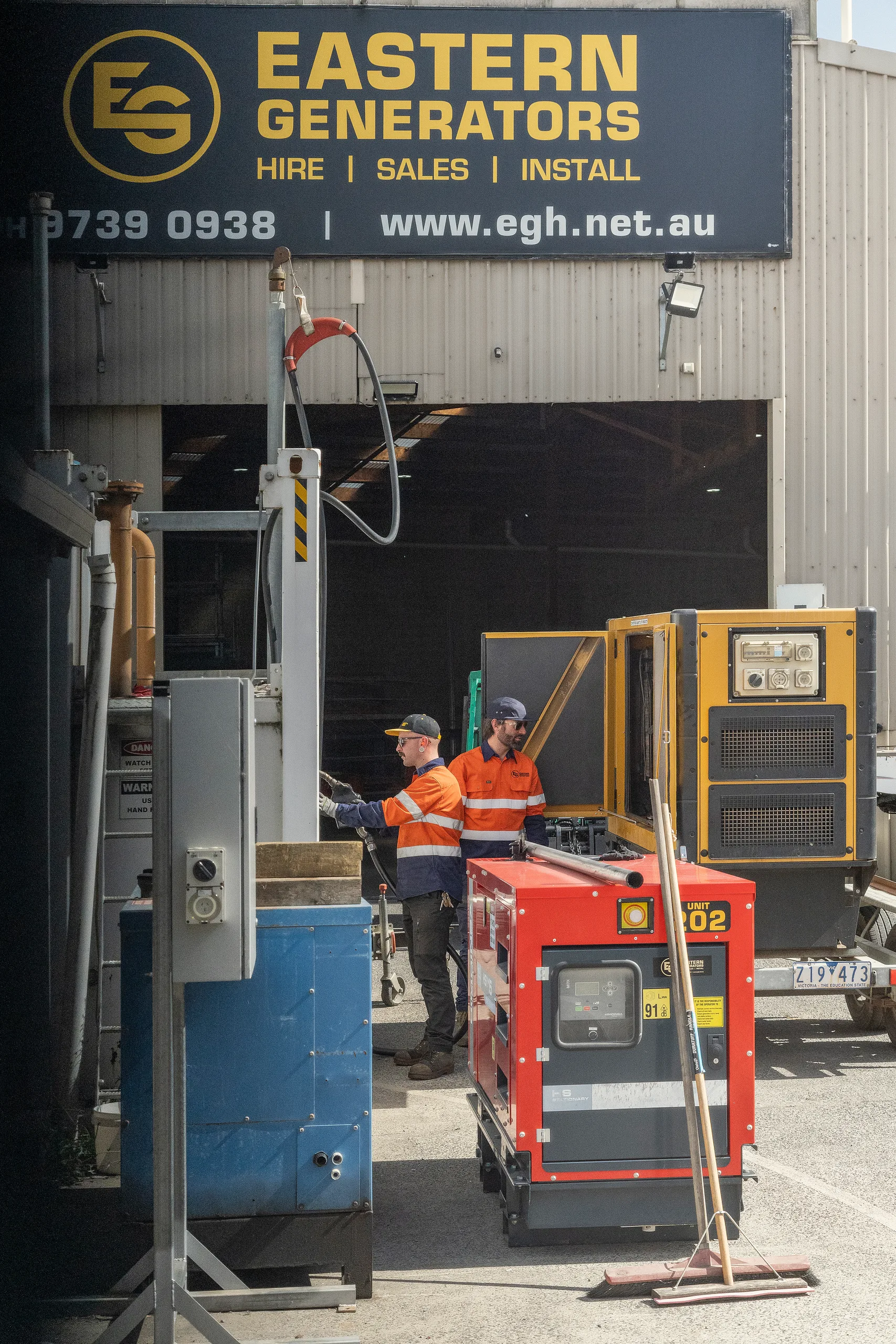 Eastern Generators crew refuelling and turning around small hire sets at the Kilsyth yard